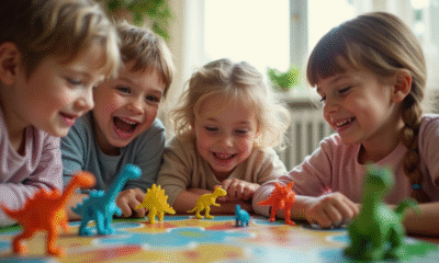 Enfants jouant avec un jeu de société dinosaure lumineux